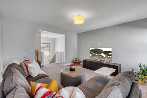 53 Sundown Grove, Cochrane, AB - Indoor Photo Showing Living Room