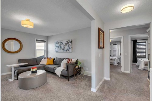 53 Sundown Grove, Cochrane, AB - Indoor Photo Showing Living Room