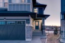 53 Sundown Grove, Cochrane, AB  - Outdoor With Facade 