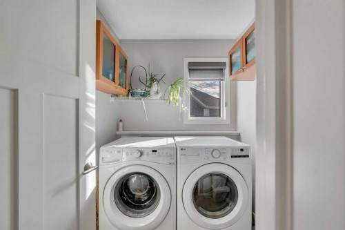 53 Sundown Grove, Cochrane, AB - Indoor Photo Showing Laundry Room