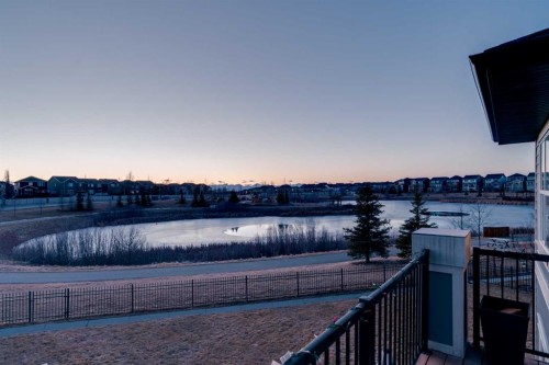 53 Sundown Grove, Cochrane, AB - Outdoor With Body Of Water With View