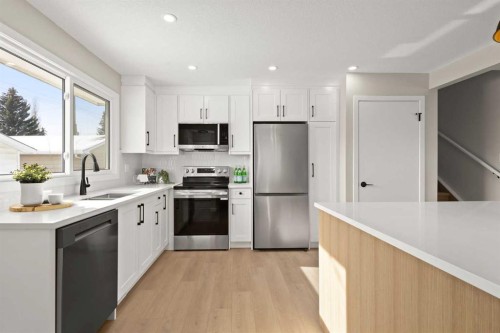 236 Silverview Way Nw, Calgary, AB - Indoor Photo Showing Kitchen With Upgraded Kitchen