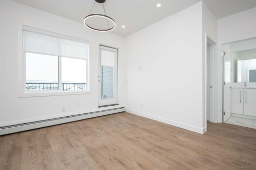 1406-111 Wolf Creek Drive Se, Calgary, AB - Indoor Photo Showing Other Room