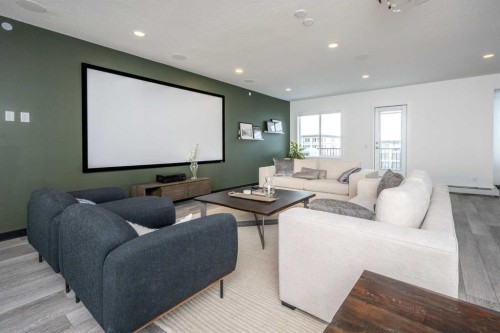1406-111 Wolf Creek Drive Se, Calgary, AB - Indoor Photo Showing Living Room