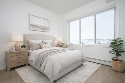 1406-111 Wolf Creek Drive Se, Calgary, AB - Indoor Photo Showing Bedroom