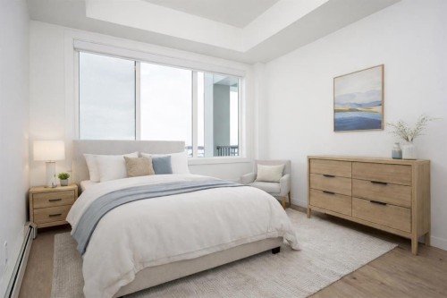 1406-111 Wolf Creek Drive Se, Calgary, AB - Indoor Photo Showing Bedroom