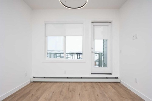 1406-111 Wolf Creek Drive Se, Calgary, AB - Indoor Photo Showing Other Room