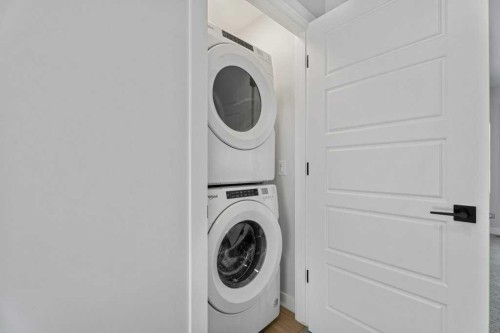 71 Ranchers View, Okotoks, AB - Indoor Photo Showing Laundry Room