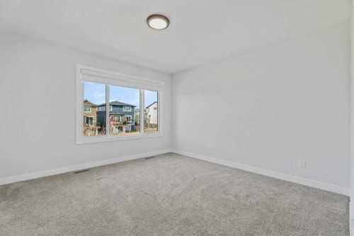 71 Ranchers View, Okotoks, AB - Indoor Photo Showing Other Room