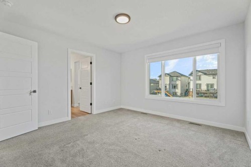 71 Ranchers View, Okotoks, AB - Indoor Photo Showing Other Room