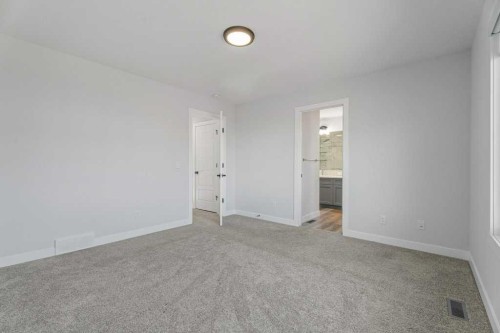 71 Ranchers View, Okotoks, AB - Indoor Photo Showing Other Room