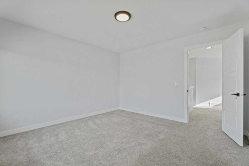 71 Ranchers View, Okotoks, AB - Indoor Photo Showing Other Room