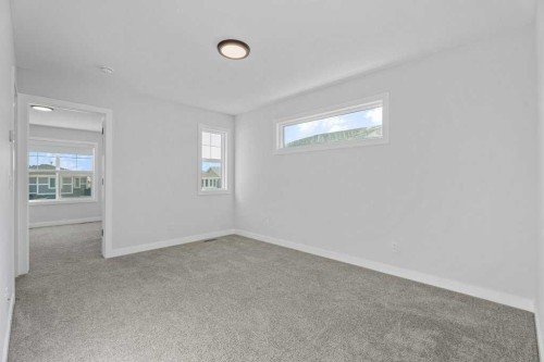 71 Ranchers View, Okotoks, AB - Indoor Photo Showing Other Room