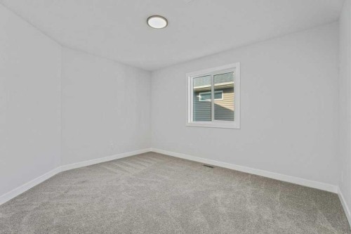 71 Ranchers View, Okotoks, AB - Indoor Photo Showing Other Room