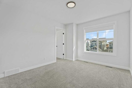 71 Ranchers View, Okotoks, AB - Indoor Photo Showing Other Room