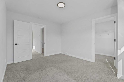 71 Ranchers View, Okotoks, AB - Indoor Photo Showing Other Room