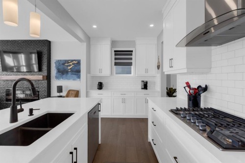 160 Precedence Hill, Cochrane, AB - Indoor Photo Showing Kitchen With Double Sink With Upgraded Kitchen