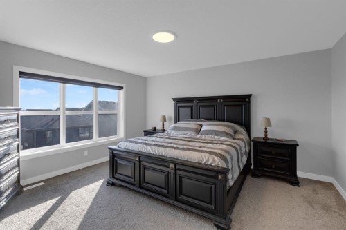 160 Precedence Hill, Cochrane, AB - Indoor Photo Showing Bedroom