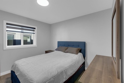 160 Precedence Hill, Cochrane, AB - Indoor Photo Showing Bedroom