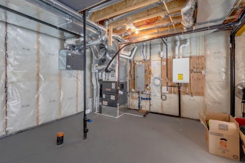 160 Precedence Hill, Cochrane, AB - Indoor Photo Showing Basement