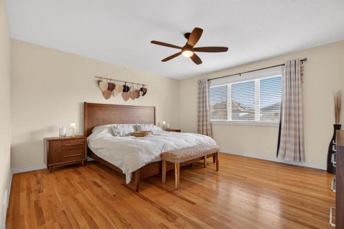 208 Cimarron Drive, Okotoks, AB - Indoor Photo Showing Bedroom