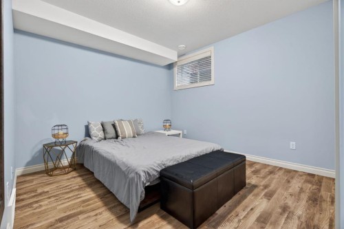 208 Cimarron Drive, Okotoks, AB - Indoor Photo Showing Bedroom