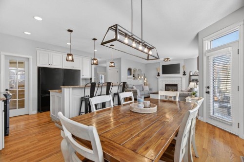 208 Cimarron Drive, Okotoks, AB - Indoor Photo Showing Dining Room