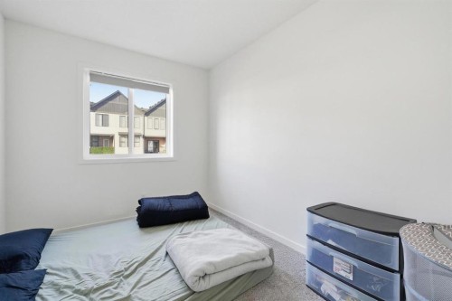 785 Southpoint Gate Sw, Airdrie, AB - Indoor Photo Showing Bedroom