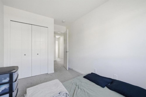 785 Southpoint Gate Sw, Airdrie, AB - Indoor Photo Showing Bedroom