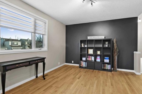 337 Douglas Glen Heath Se, Calgary, AB - Indoor With Fireplace