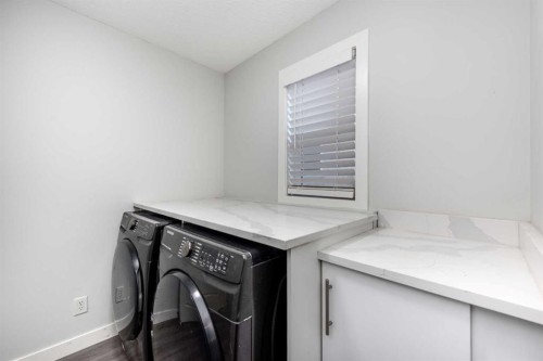 83 Cranleigh Common Se, Calgary, AB - Indoor Photo Showing Laundry Room