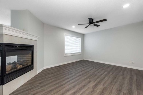 83 Cranleigh Common Se, Calgary, AB - Indoor With Fireplace