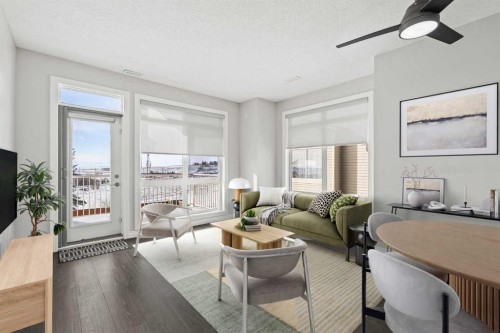 20-117 Rockyledge View Nw, Calgary, AB - Indoor Photo Showing Living Room With Fireplace
