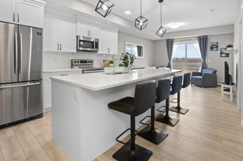 406-370 Harvest Hills Common NE Calgary, AB T3K 2M8