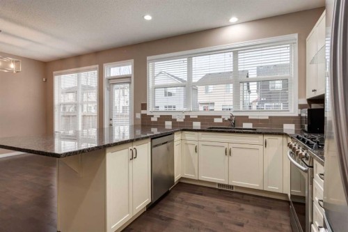 301 Auburn Meadows Boulevard Se, Calgary, AB - Indoor Photo Showing Kitchen With Upgraded Kitchen