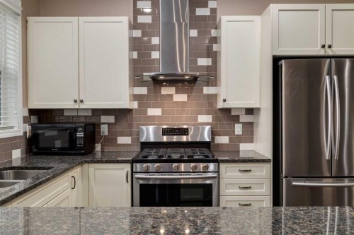 301 Auburn Meadows Boulevard Se, Calgary, AB - Indoor Photo Showing Kitchen With Stainless Steel Kitchen With Double Sink With Upgraded Kitchen
