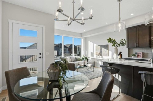 129 Wild Rose Way Se, Calgary, AB - Indoor Photo Showing Dining Room