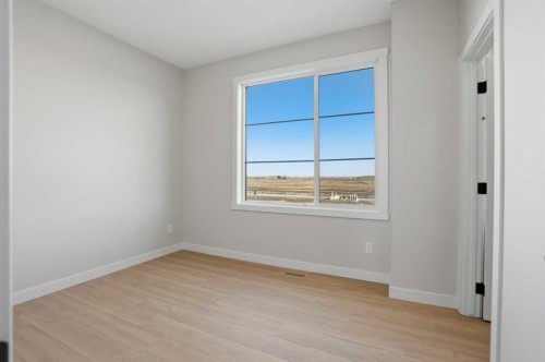 129 Wild Rose Way Se, Calgary, AB - Indoor Photo Showing Other Room