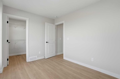 129 Wild Rose Way Se, Calgary, AB - Indoor Photo Showing Other Room