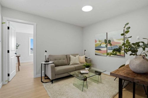 129 Wild Rose Way Se, Calgary, AB - Indoor Photo Showing Living Room