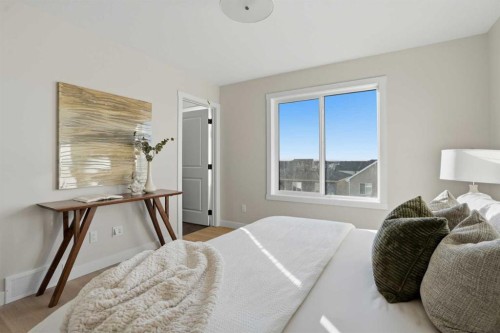 129 Wild Rose Way Se, Calgary, AB - Indoor Photo Showing Bedroom