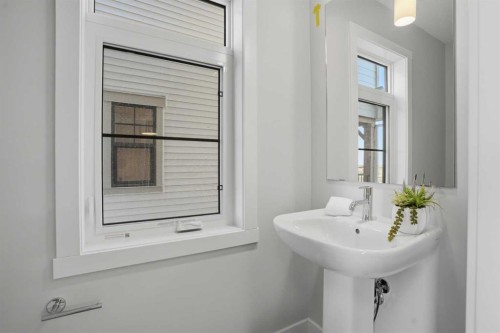 129 Wild Rose Way Se, Calgary, AB - Indoor Photo Showing Bathroom