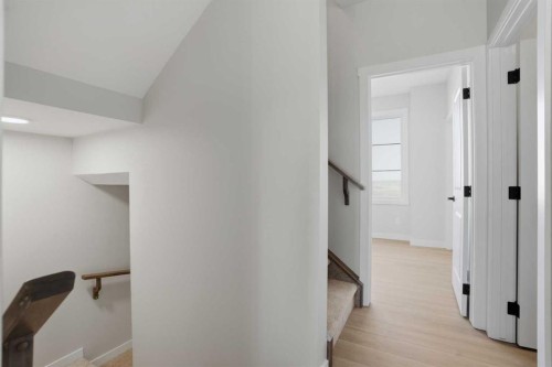 129 Wild Rose Way Se, Calgary, AB - Indoor Photo Showing Other Room