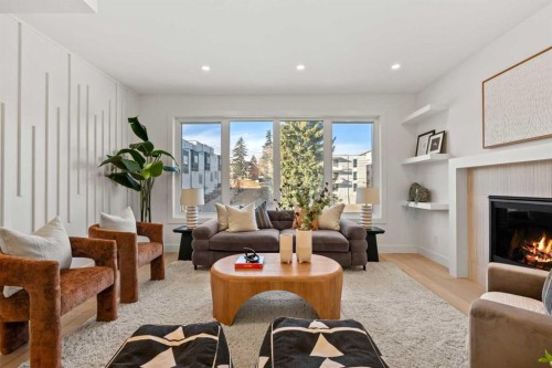 2518 16B Street Sw, Calgary, AB - Indoor Photo Showing Living Room With Fireplace