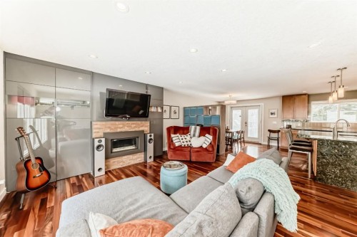 12 Varbow Place Nw, Calgary, AB - Indoor Photo Showing Living Room With Fireplace
