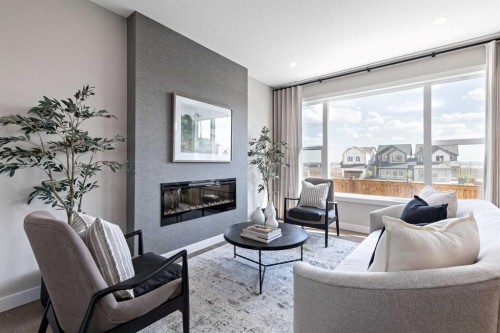89 Heartwood Lane Se, Calgary, AB - Indoor Photo Showing Living Room With Fireplace