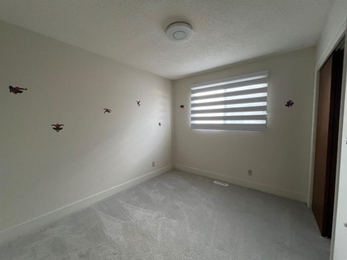 6807 Huntchester Road Ne, Calgary, AB - Indoor Photo Showing Other Room