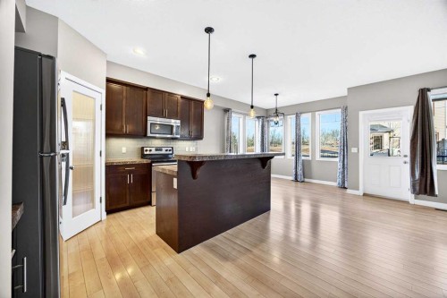 214-413 River Avenue, Cochrane, AB - Indoor Photo Showing Kitchen With Stainless Steel Kitchen With Upgraded Kitchen