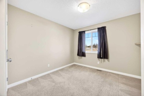 214-413 River Avenue, Cochrane, AB - Indoor Photo Showing Other Room