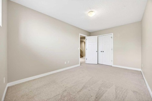 214-413 River Avenue, Cochrane, AB - Indoor Photo Showing Other Room